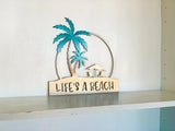 Life's A Beach Palm Tree Chairs Scene Metal Sign | Weatherproof Door Hanger or Wall Art | Powder Coat